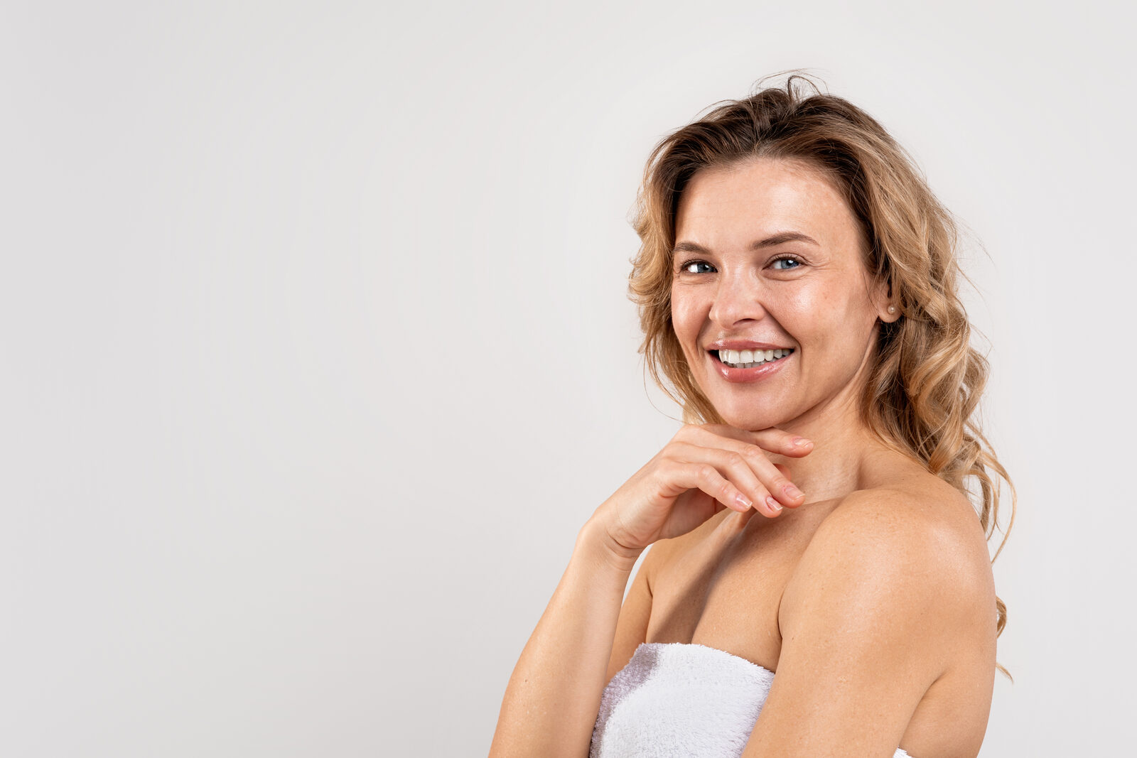 Mature woman with healthy skin, perimenopause and menopause skin care guide, Bar Beauty Medical Toronto