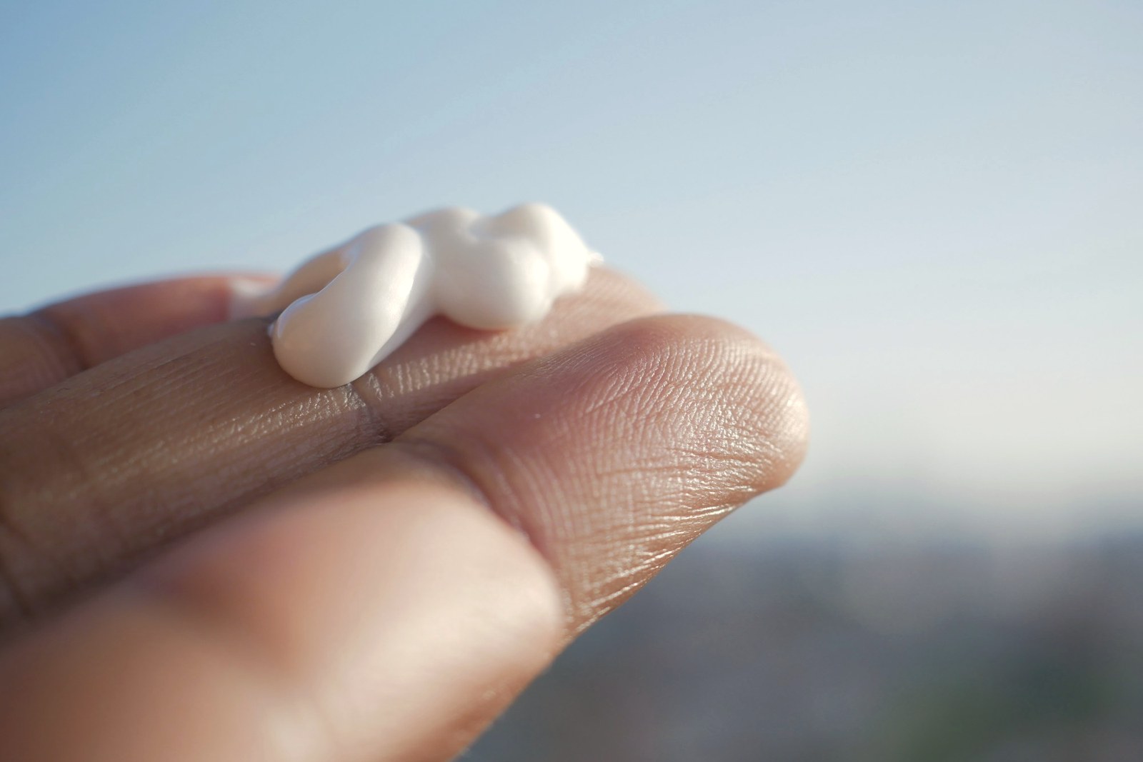 A plain dollop of barrier cream on fingertips