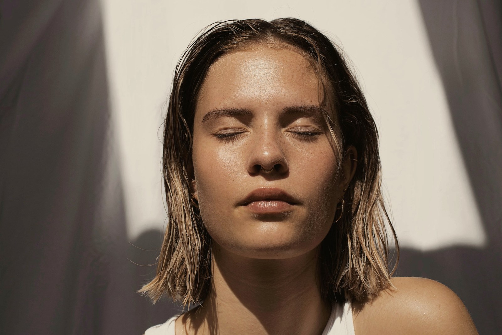 A woman with calm settled skin in daylight