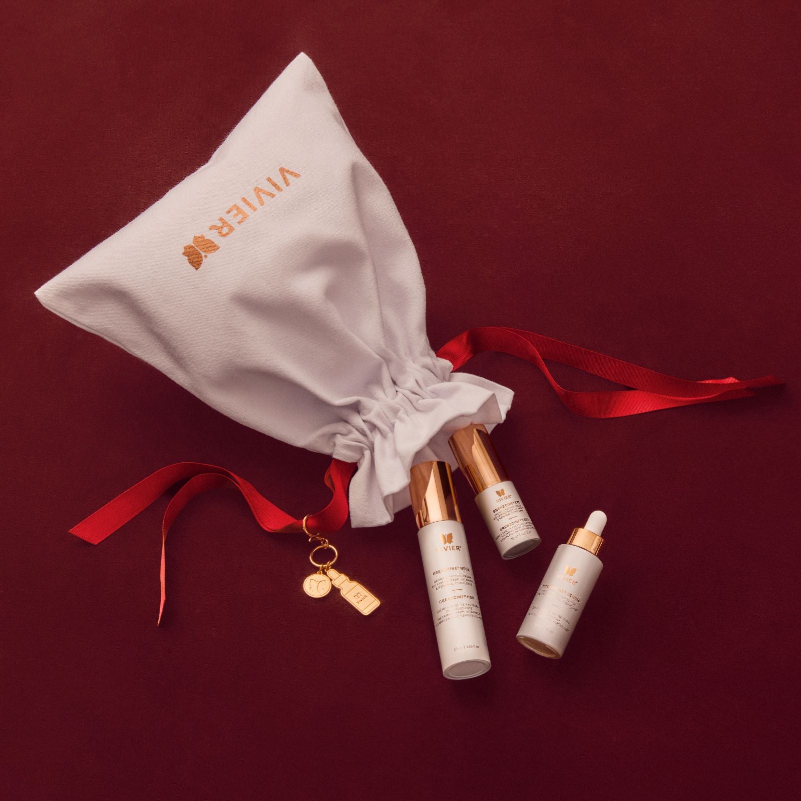 Vivier Advanced Firming Gift Set flat lay with GrenzCine Serum, Eye and Neck